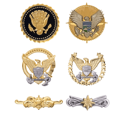 A set of six military insignia, including the eagle.